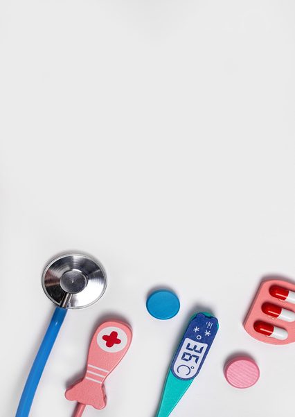 Banner with medical tools. Health care, medicine concept. Stethoscope, thermometer, pills. Doctor instruments kit for children. Copy space. High quality photo